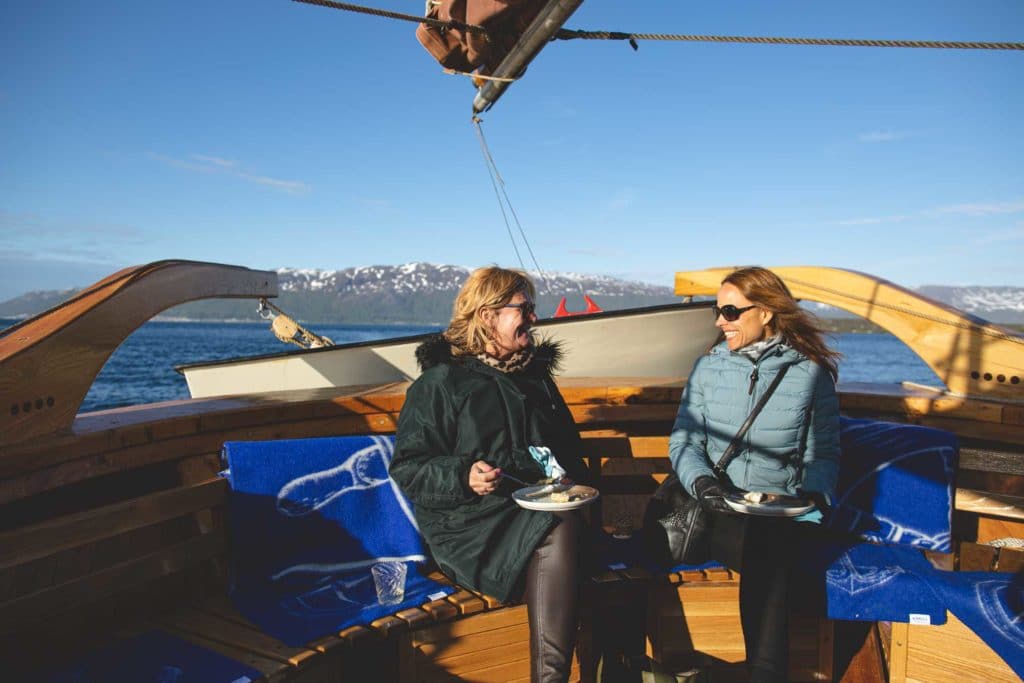 two smiling women on board hermes 2